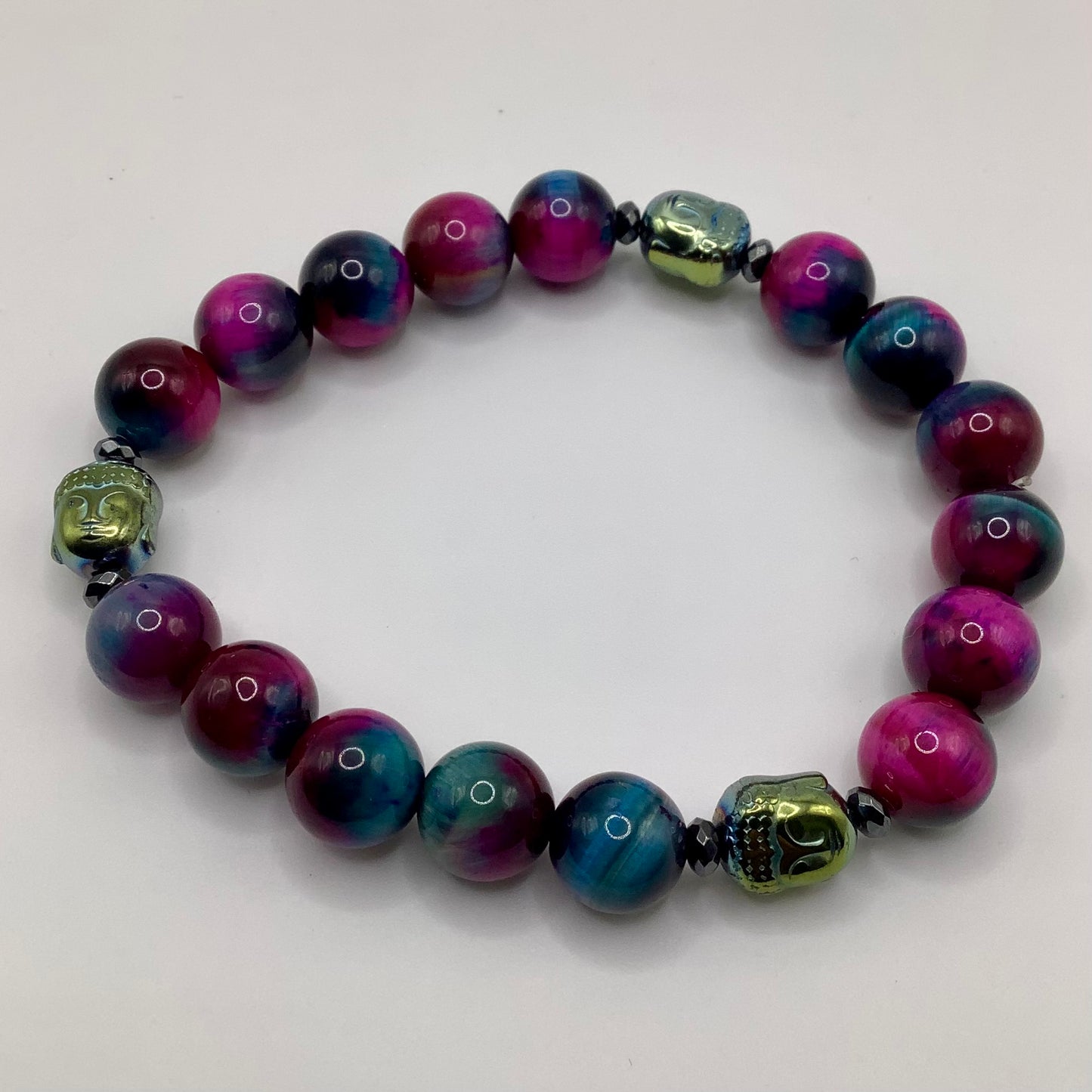 Mystic Tigers Eye, rainbow hematite Buddha 12mm black hematite